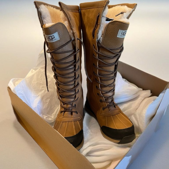 UGG Shoes - Ugg boots size 9 women’s in new condition. Lace up style, beautiful, has box.